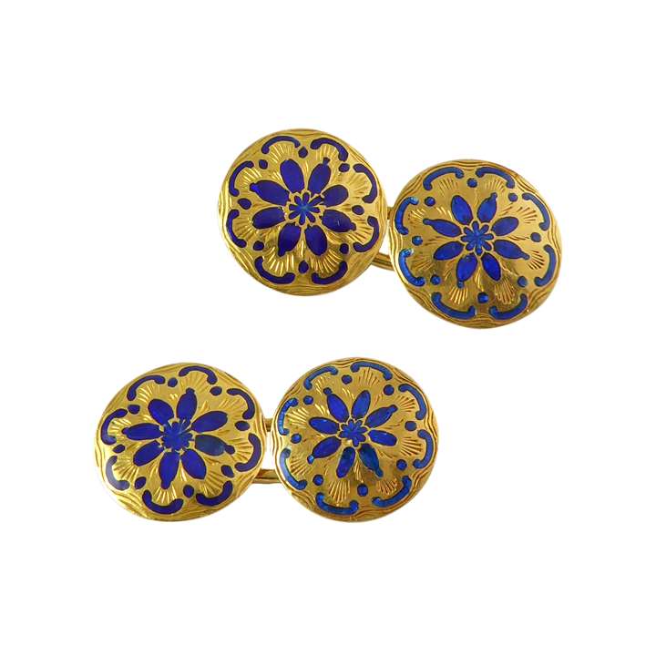 Pair of gold and blue enamel cufflinks, each circular panel with a blue enamel flower design on an engraved gold background